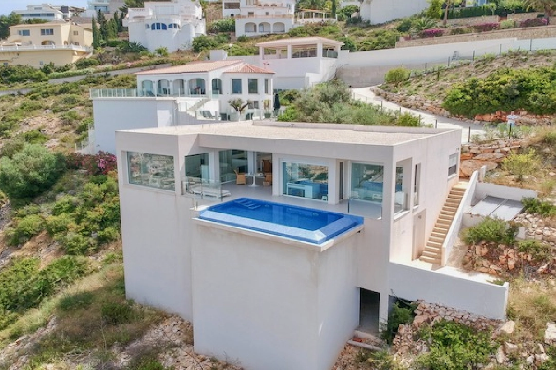 villa en Benitachell(La Cumbre del Sol) en vente, construit 140 m², aire acondicionado, terrain 1395 m², 2 chambre, 2 salle de bains, piscina, ref.: CA-H-1815-AMB-1